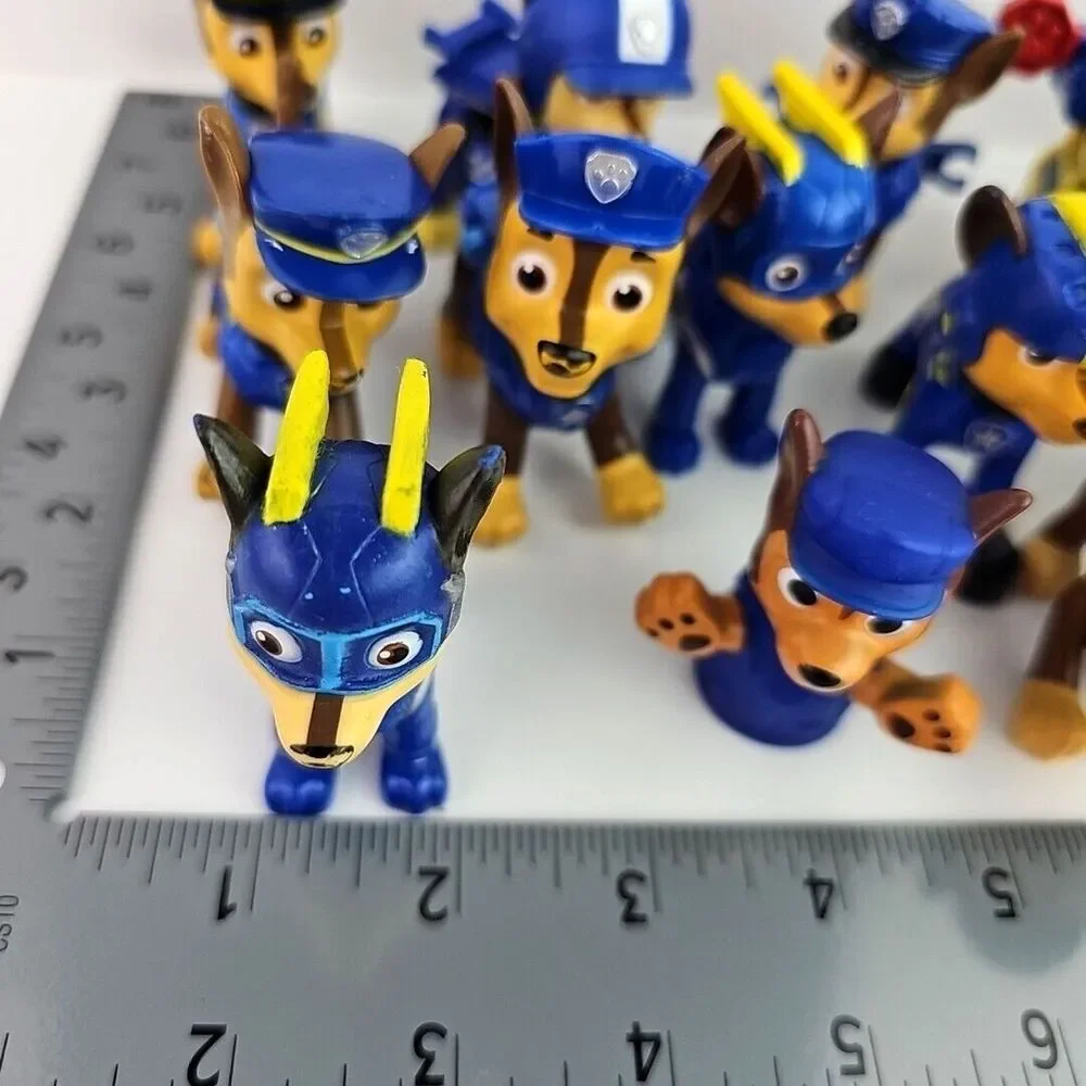 Paw Patrol Chase Figure Lot Police Dog Mixed Versions 15 Pieces Preowned Toys